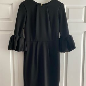 Avery G black shift dress with bell sleeves and gold zipper details. Worn once